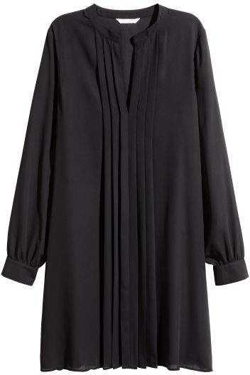 مدل مانتو ساده دکمه دار بلند مشکی