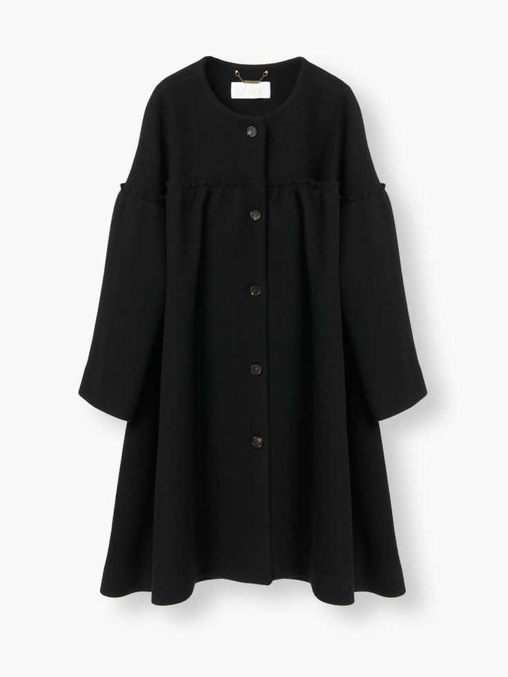 مدل مانتو ساده دکمه دار کوتاه مشکی